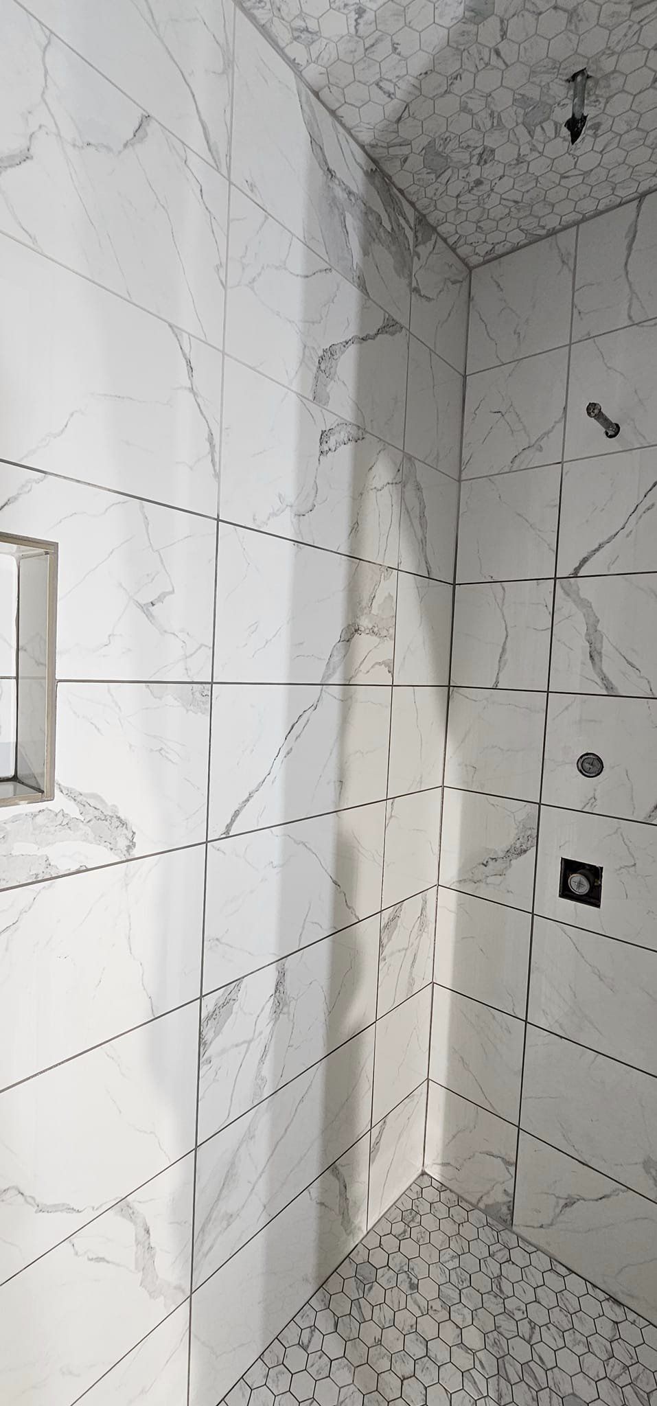 grey and white tile shower