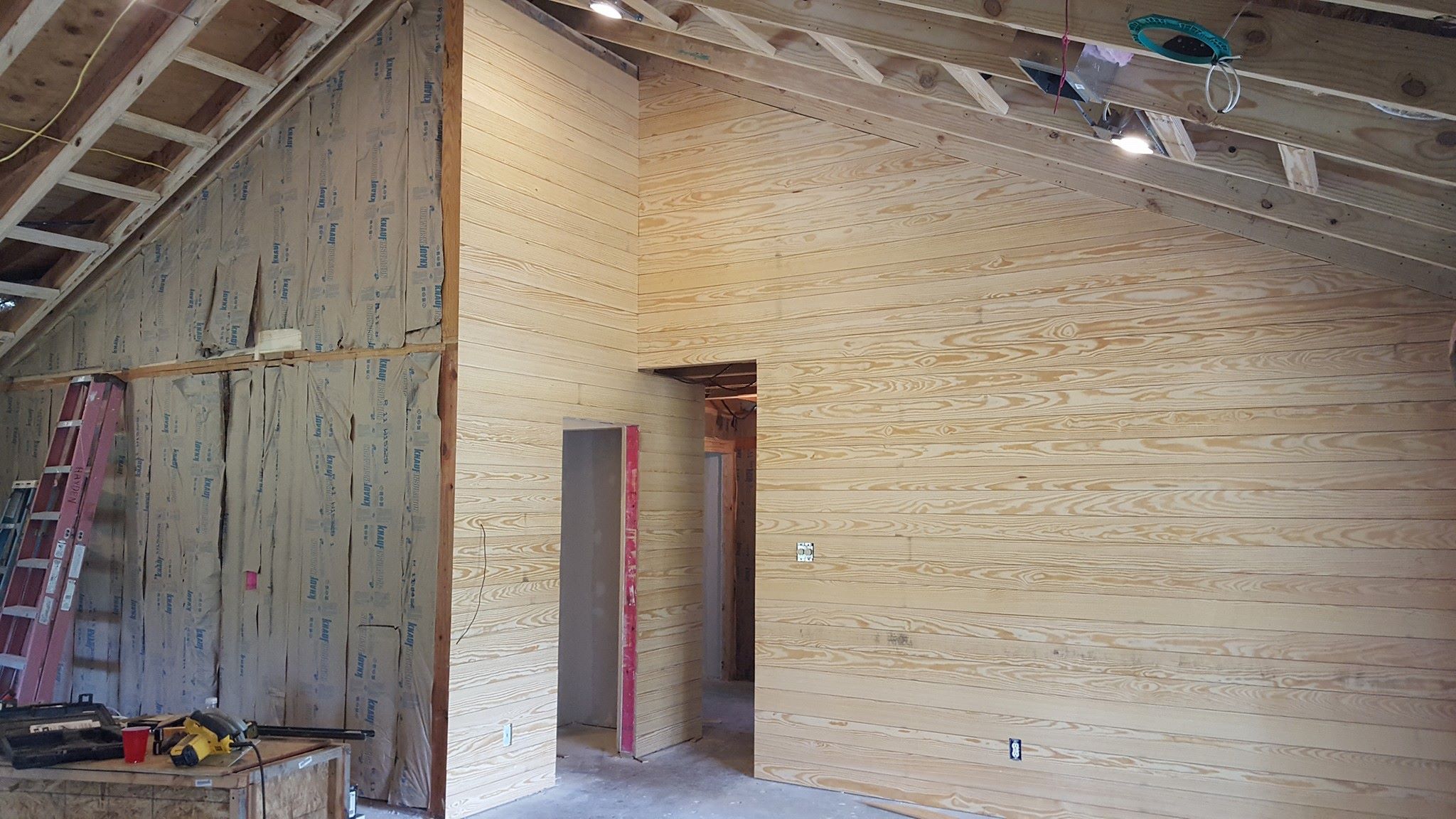 wood paneling installation on wall