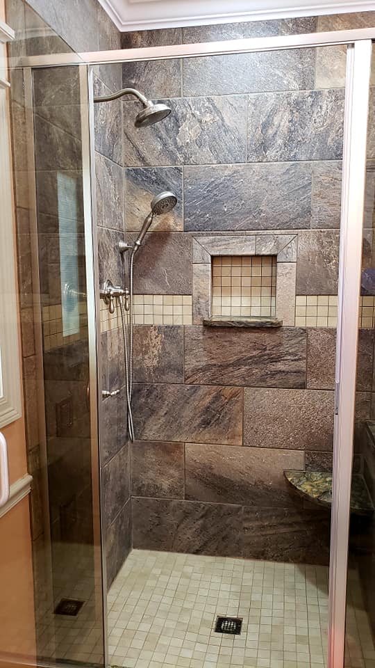 warm toned tile shower